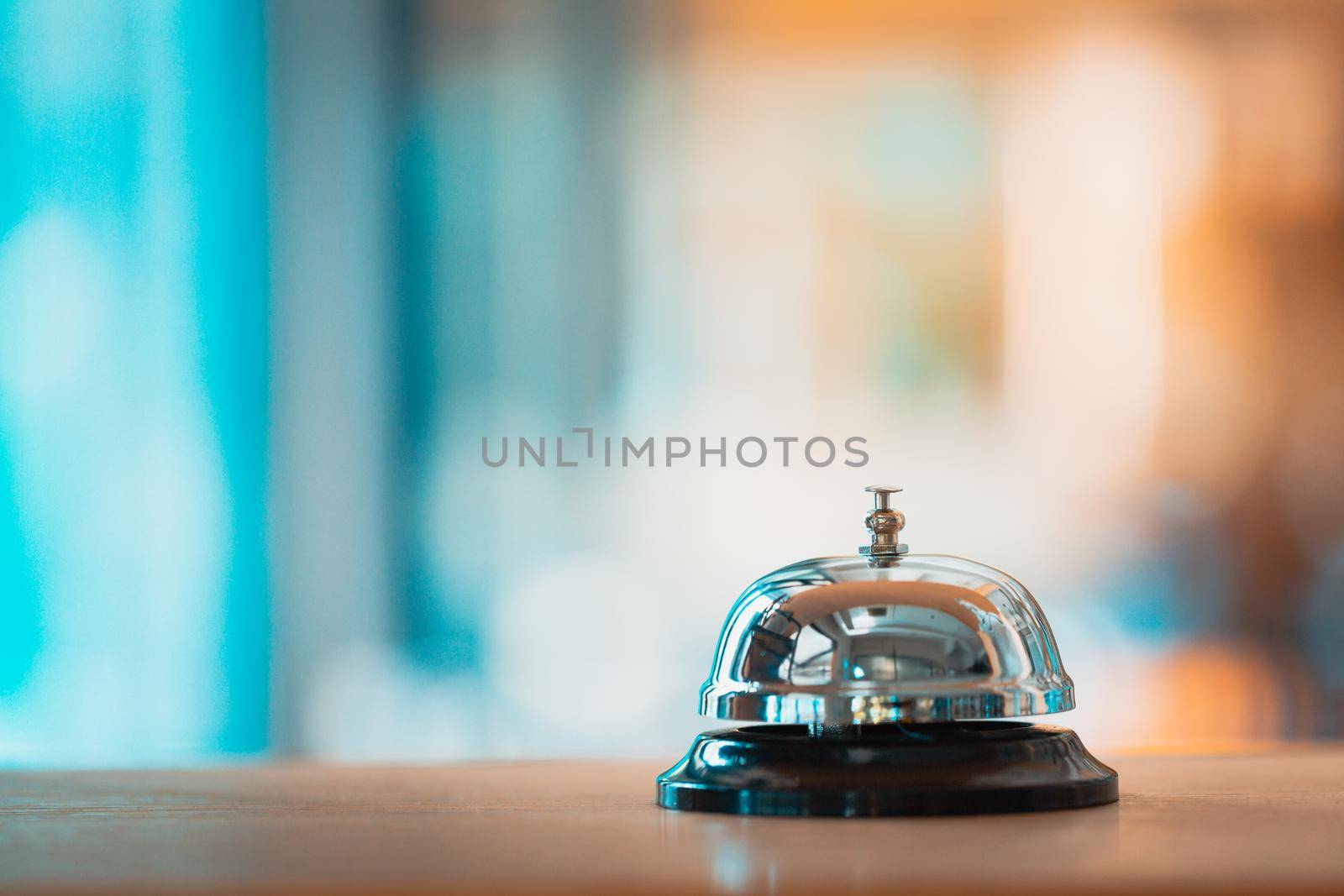 Bell on counter for service with blurred background