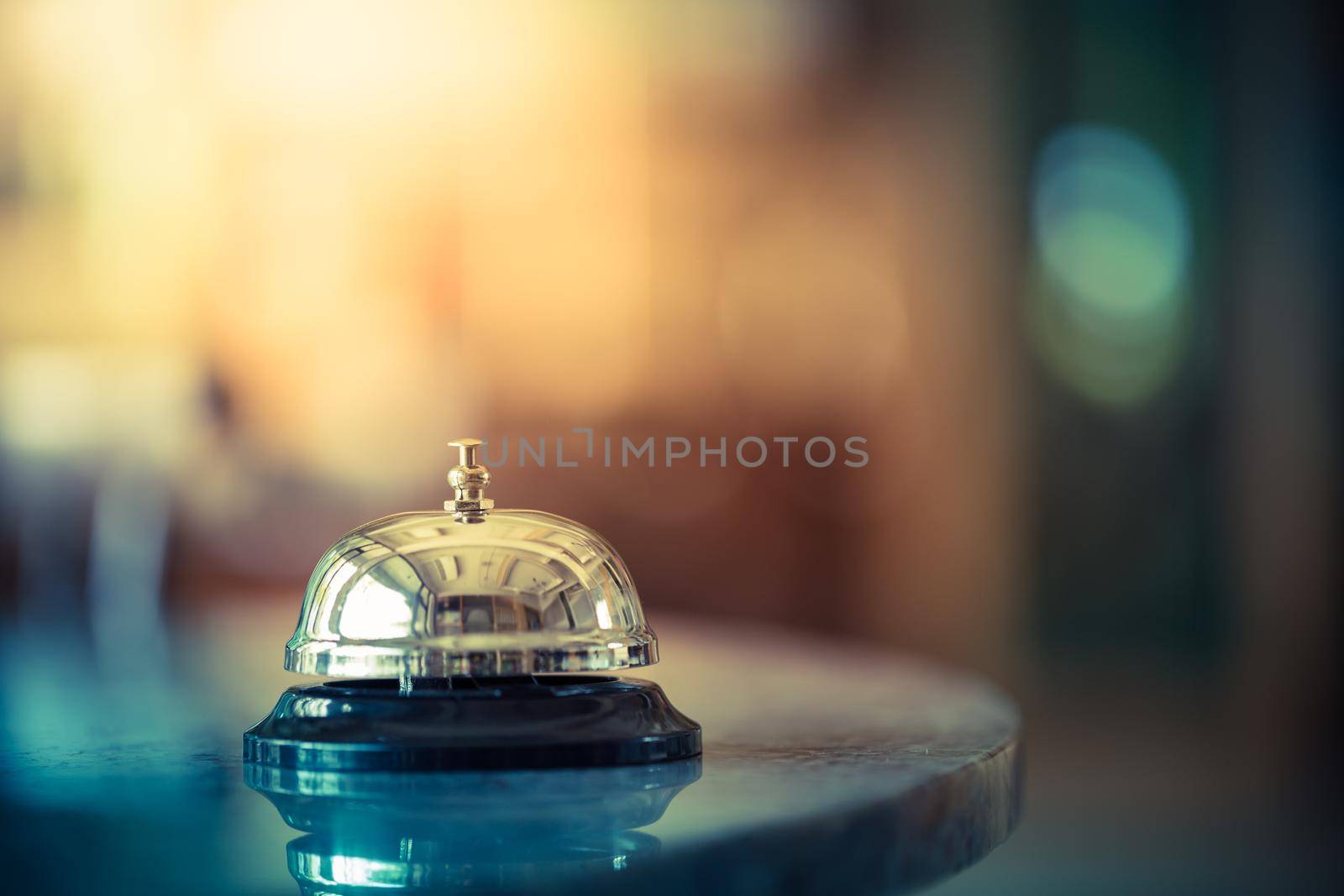 Bell on counter for service with blurred background