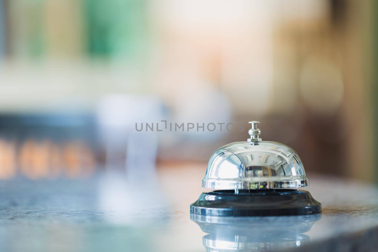 Bell on counter for service with blurred background