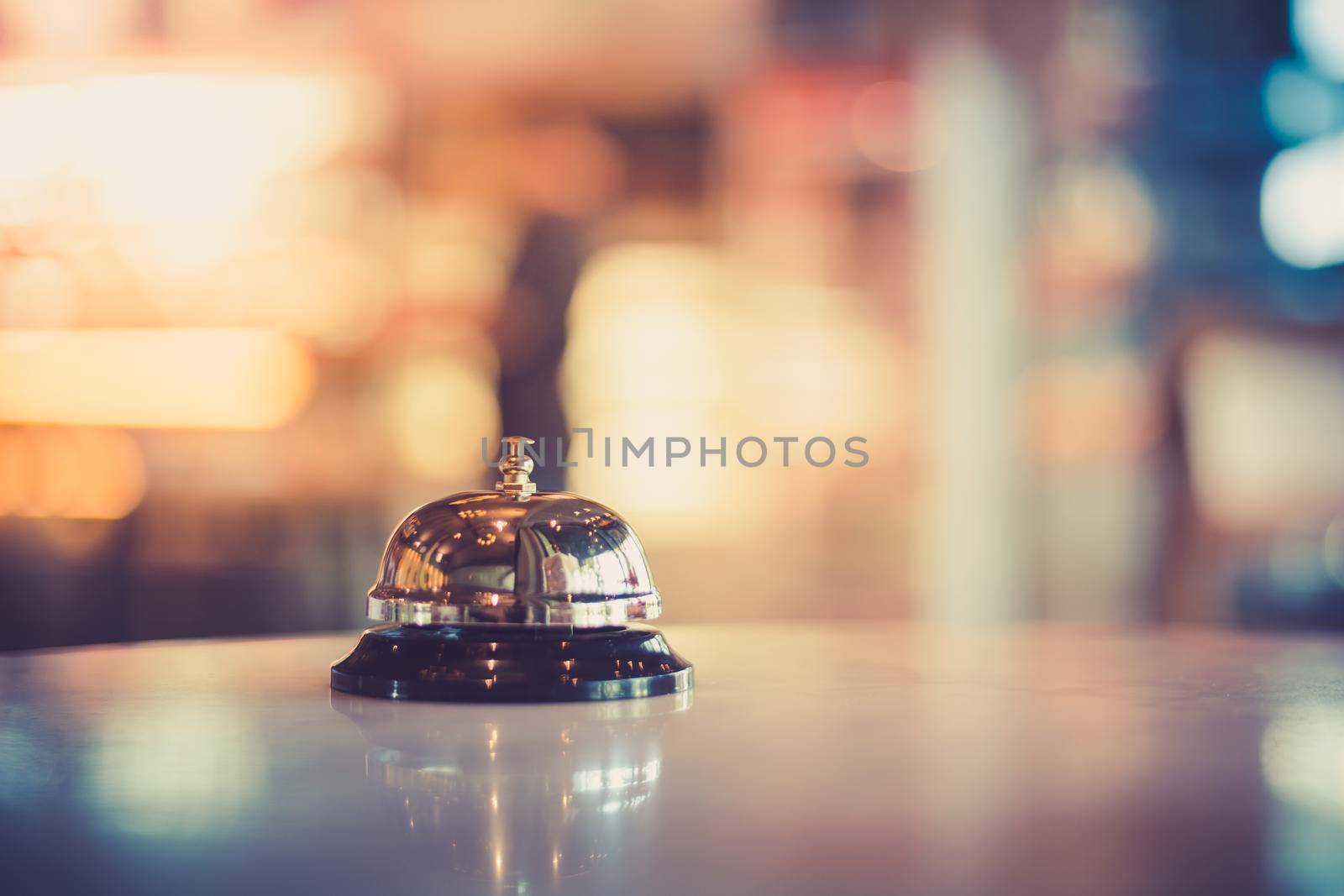 Bell on counter for service with blurred background