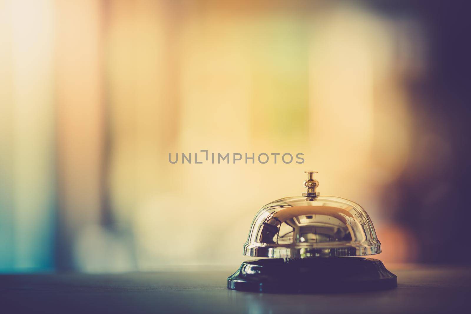 Bell on counter for service with blurred background