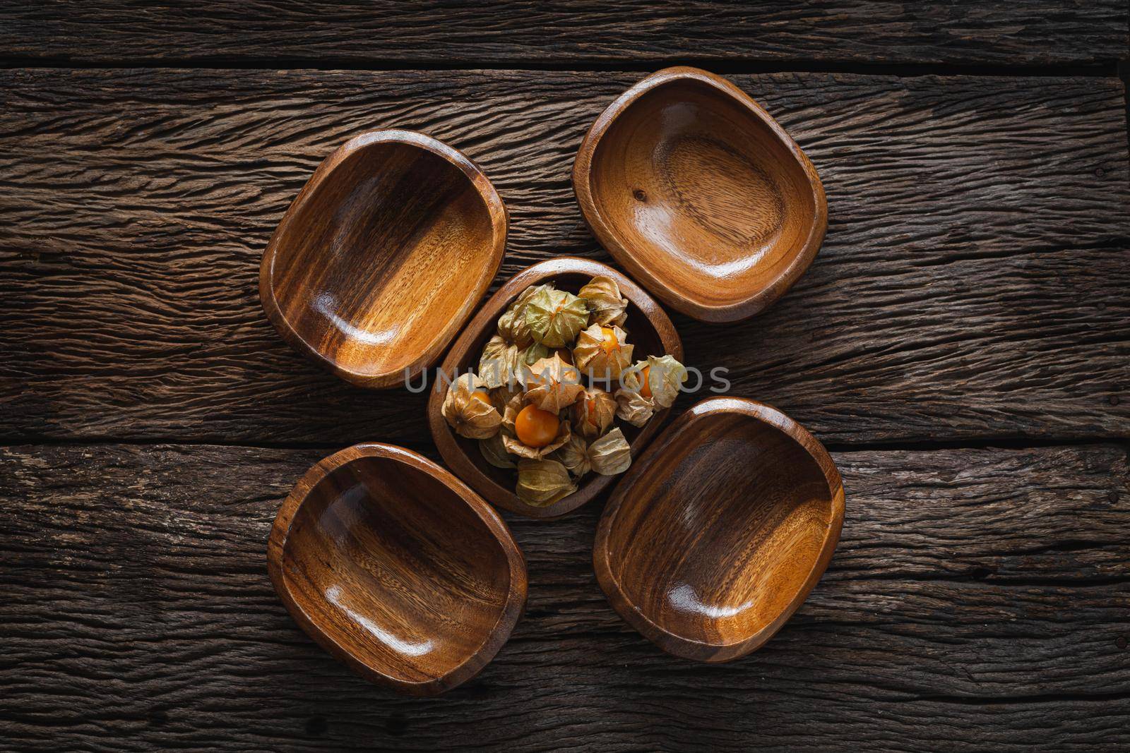 Cape Gooseberries in a group on wood