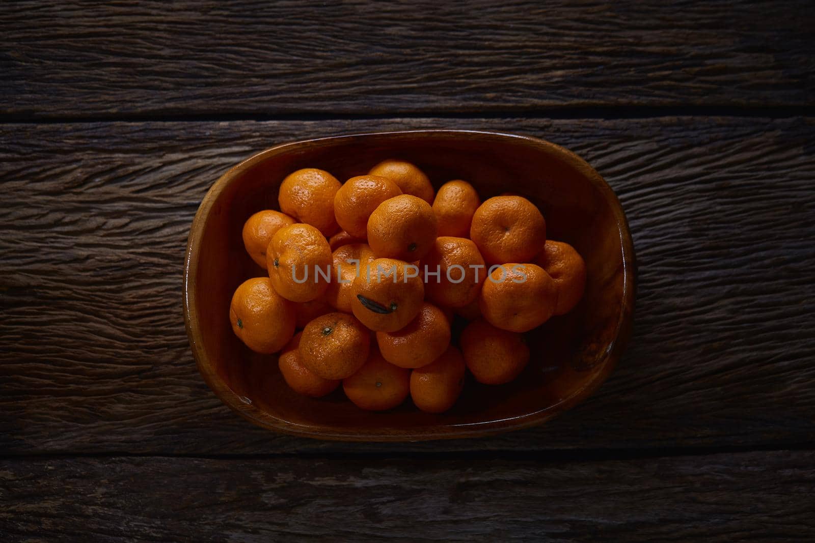 Still life with orange on wood