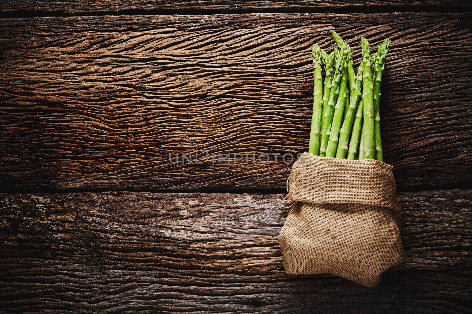 Fresh Asparagus in sack  by Wasant