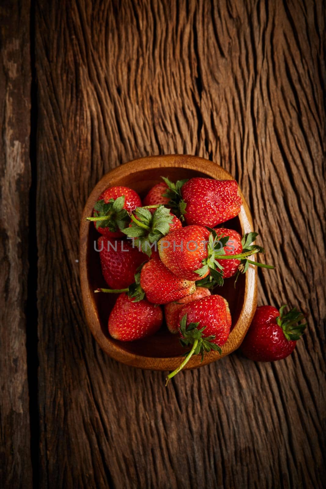 Strawberries on wood. Top view