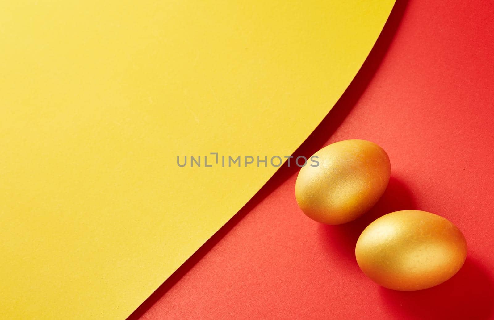 Couple Eggs Easter golden on two tone background