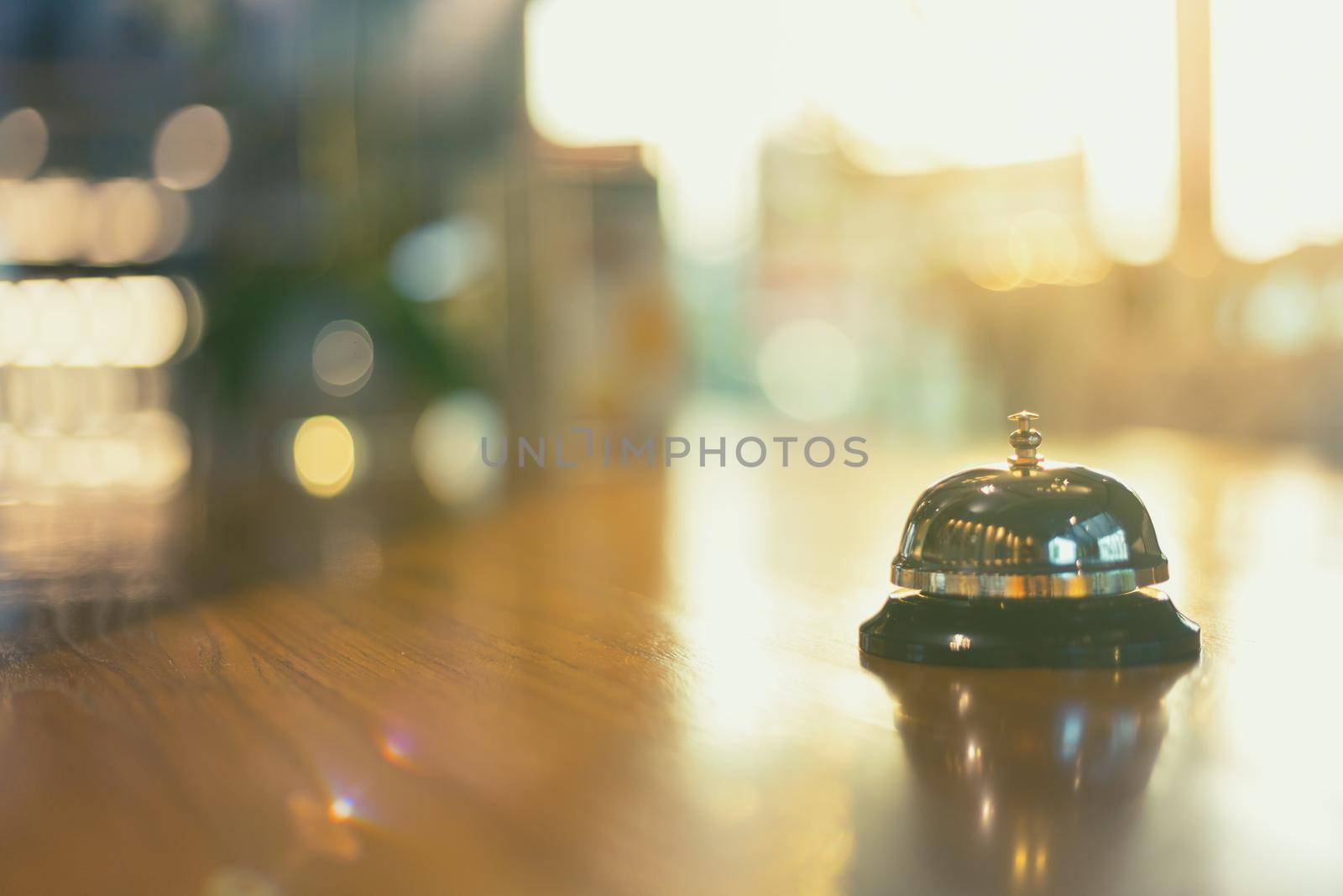 Bell on counter for service with blurred background