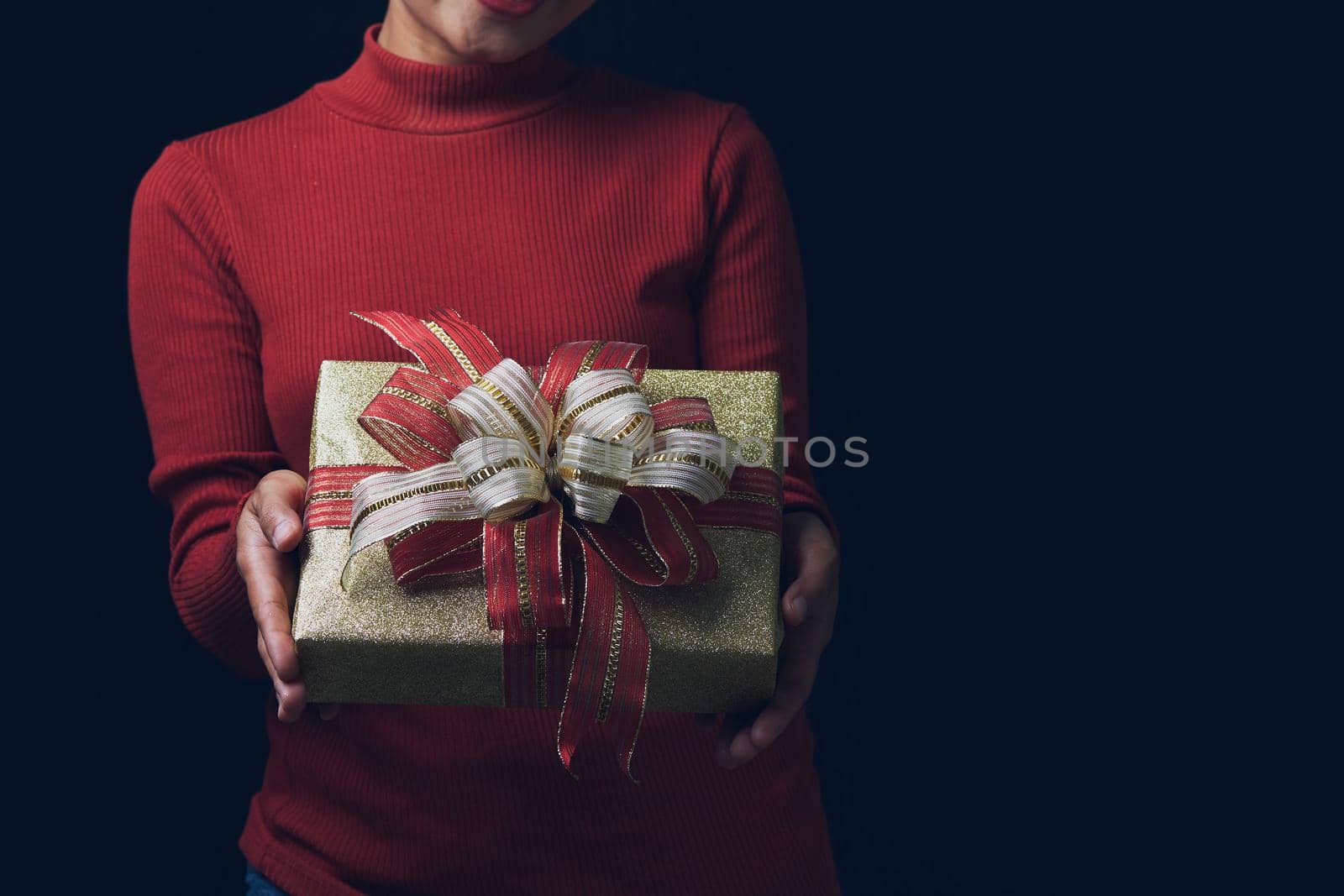 Young woman with gift box by Wasant
