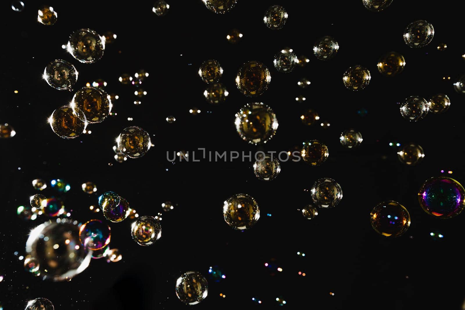 Blur Abstract colorful soap bubbles wallpaper isolated on black background