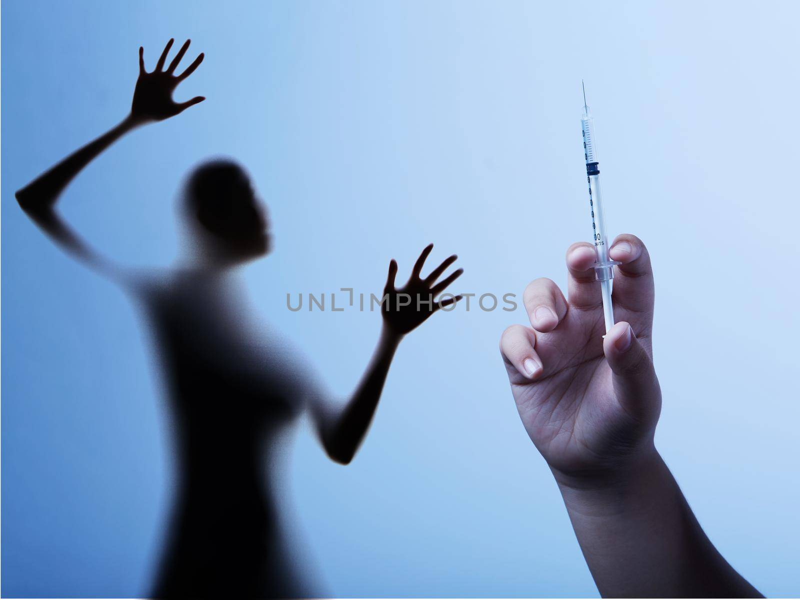 Woman is fear and cries from syringe with vaccination doctor,Corona Virus 19 concept