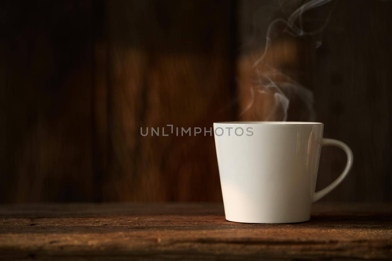 White cup of coffee by Wasant