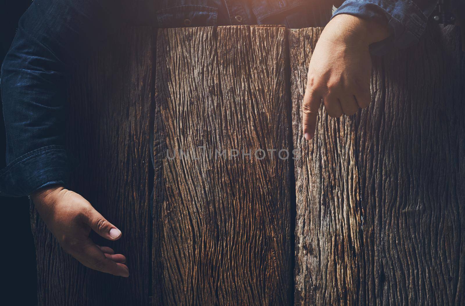 Wooden texture empty with hands 's man for text advertising