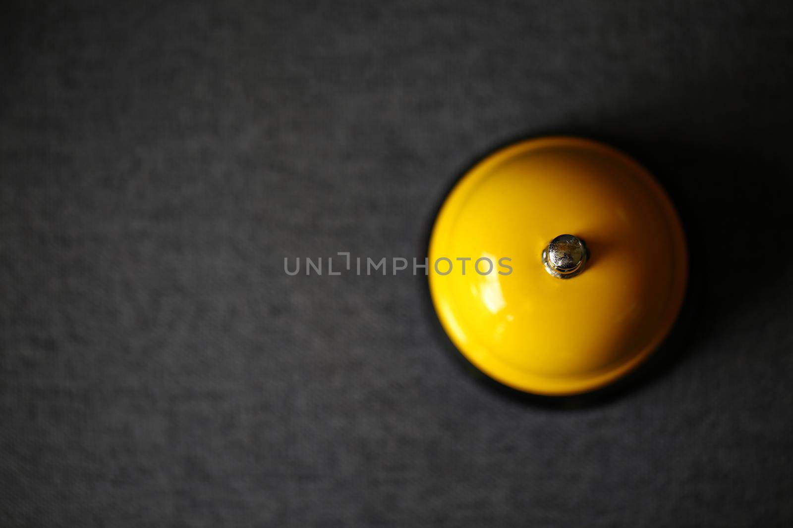 Bell on counter for service with blurred background
