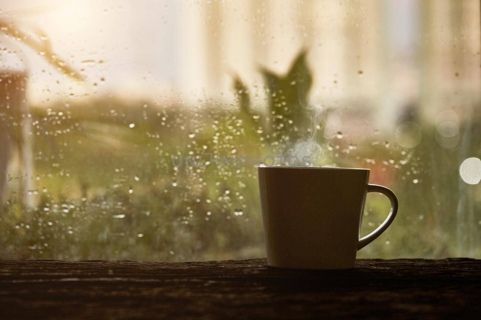 Cup of coffee with rain drop by Wasant