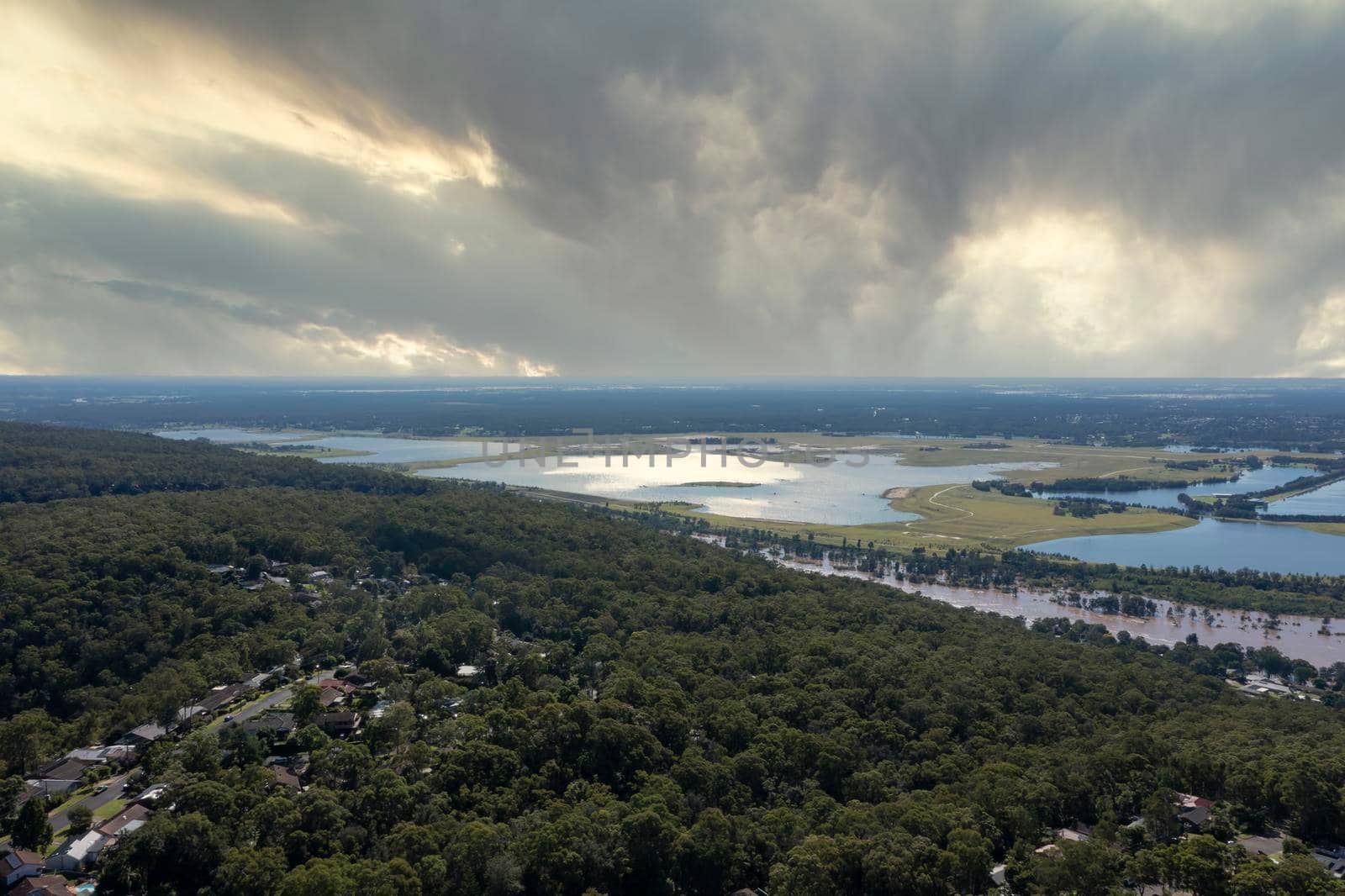 Aerial view of flooding of the Nepean River in Sydney in Australia by WittkePhotos