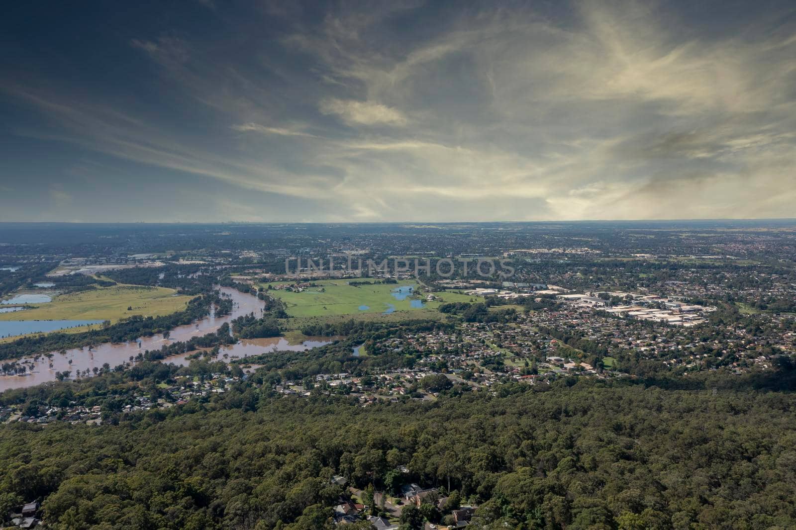 Aerial view of flooding of the Nepean River in Sydney in Australia by WittkePhotos