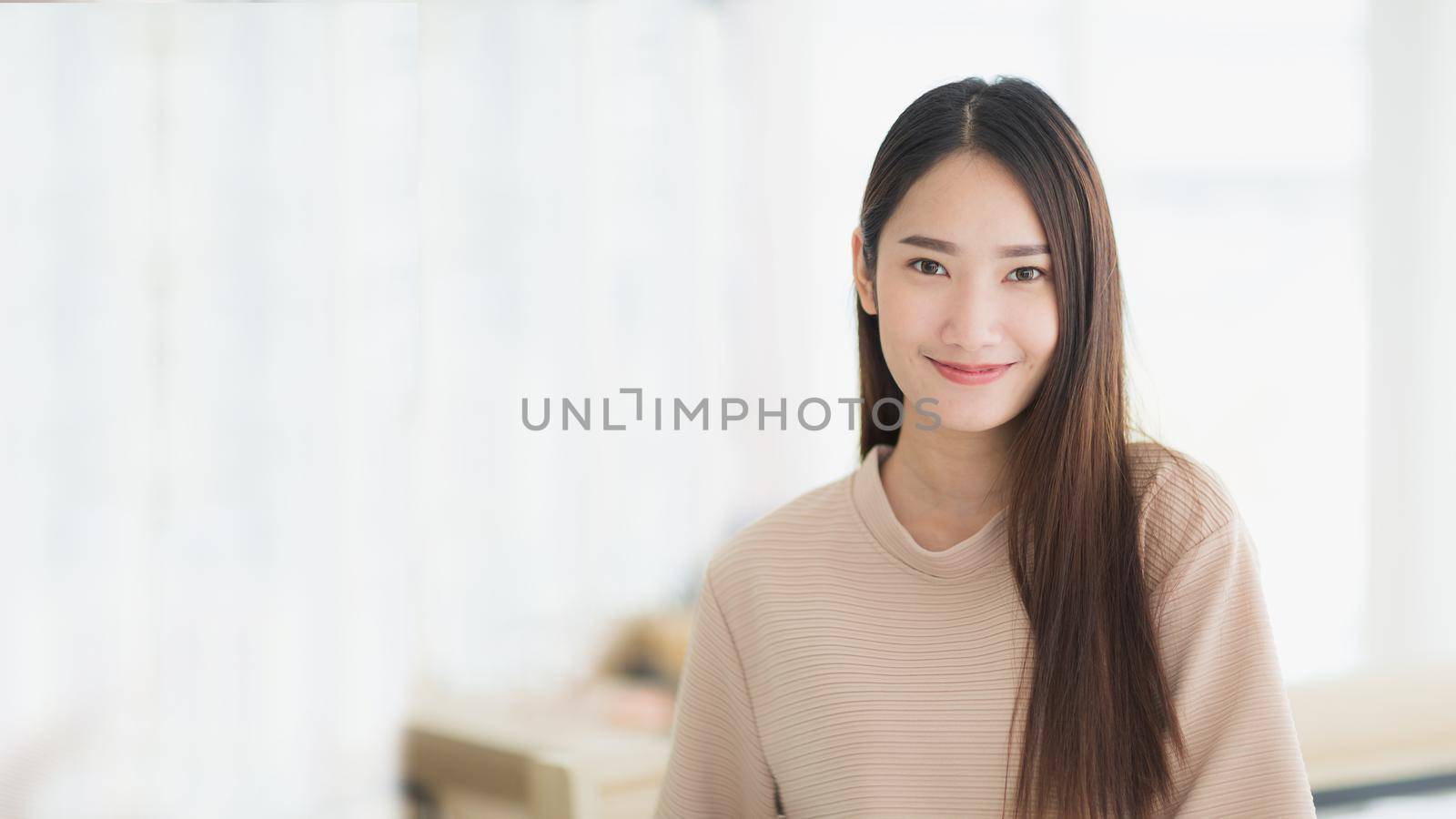 Beautiful Asia woman is smiling and happy with comfortable clothes. Banner of Asia woman