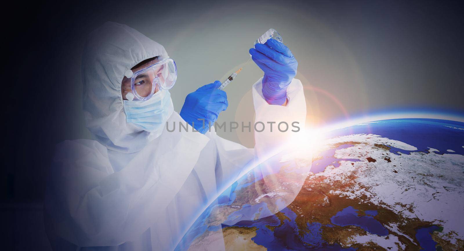 Scientists experiment with vaccines to treat viruses Covid-19 With the needs of people around the world, doctors hold a syringe with a vaccine to prevent Covid-19. Element of this image furnished by Nasa