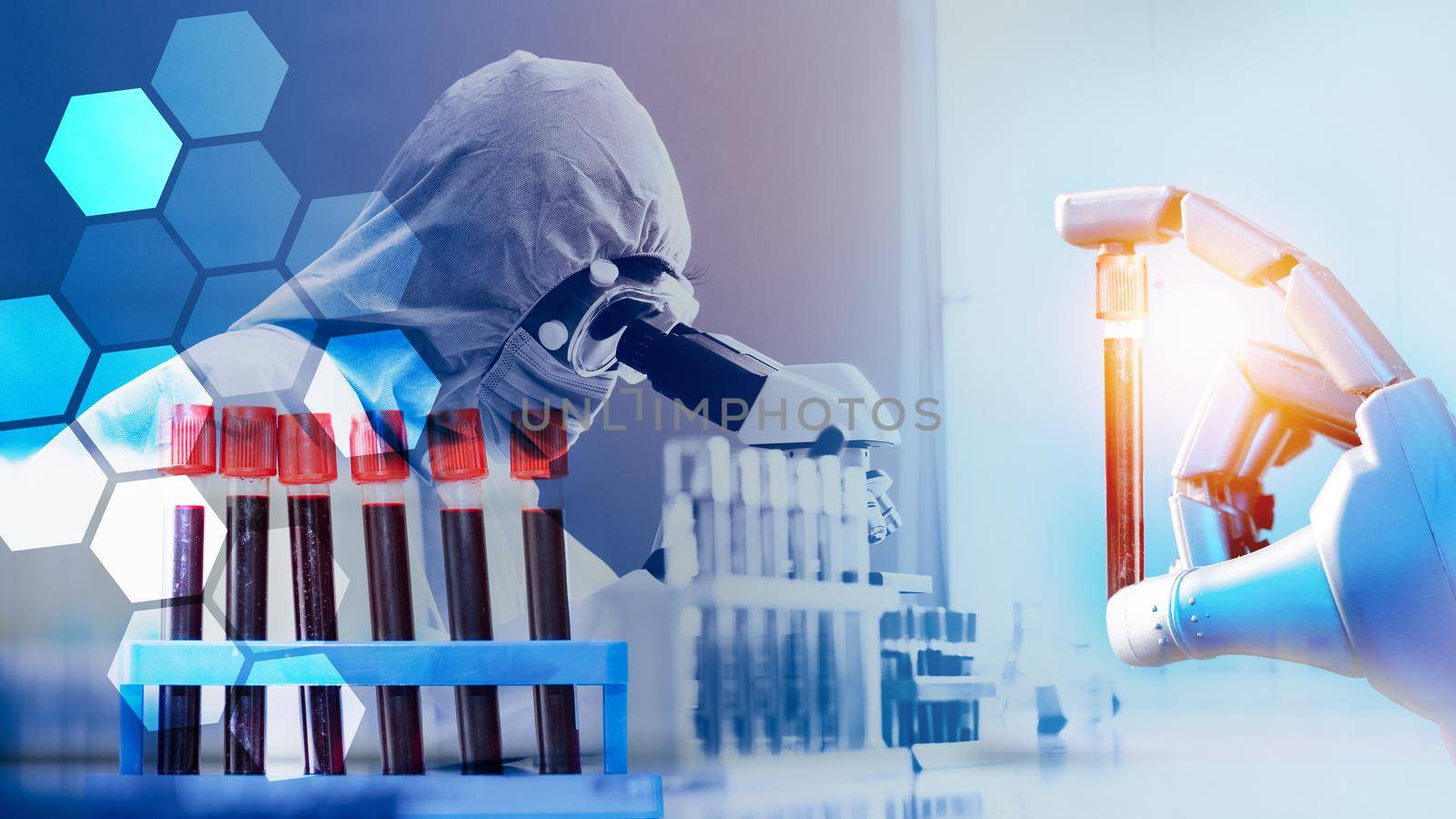 scientist with microscope in biohazard protection clothing analyzing covid 19 sample
