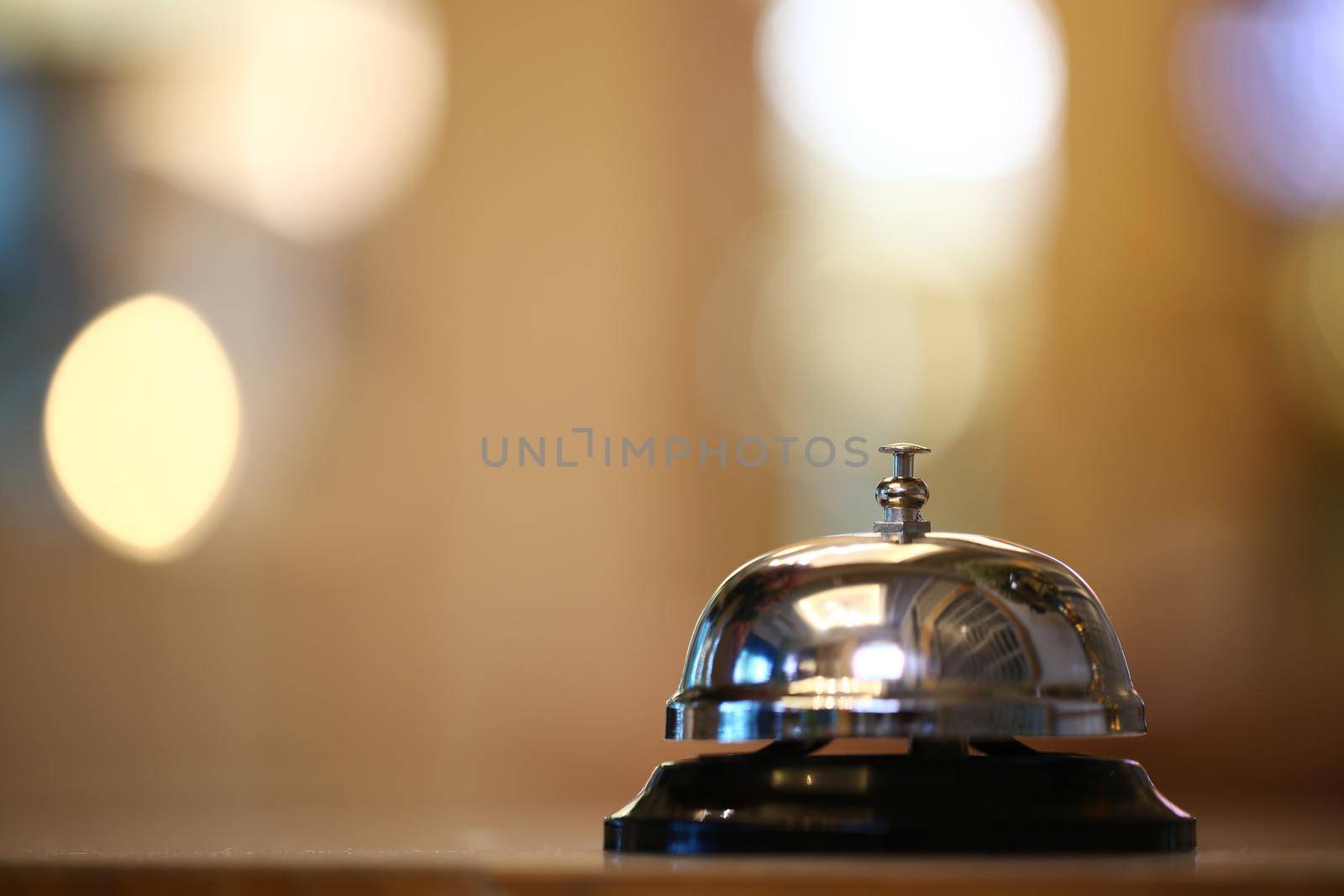 Bell on counter for service with blurred background