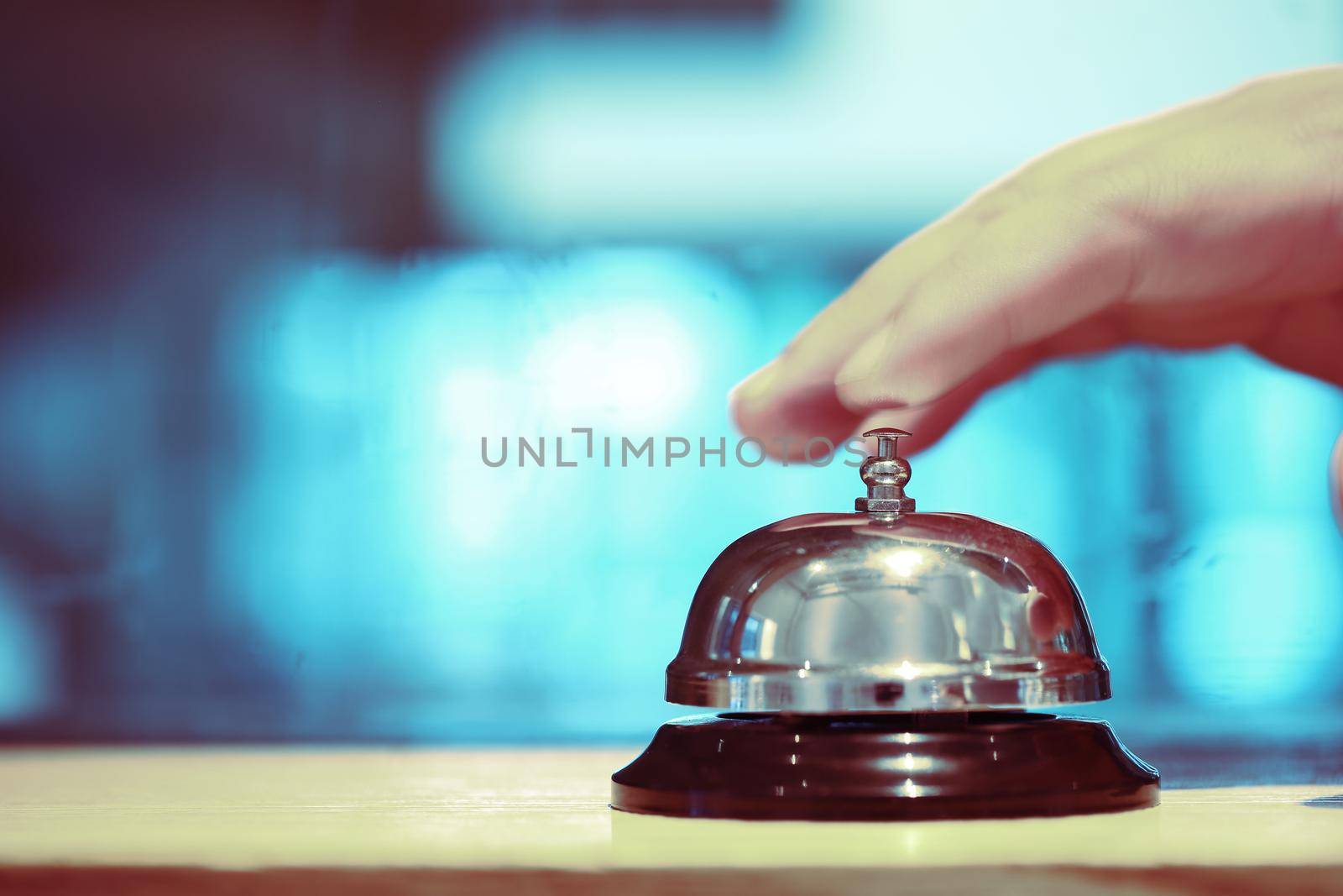 Bell on counter for service with blurred background