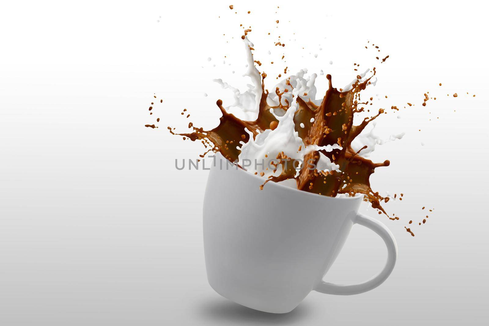 Splash of coffee and milk in white cup isolated on white background with clipping path, movement action