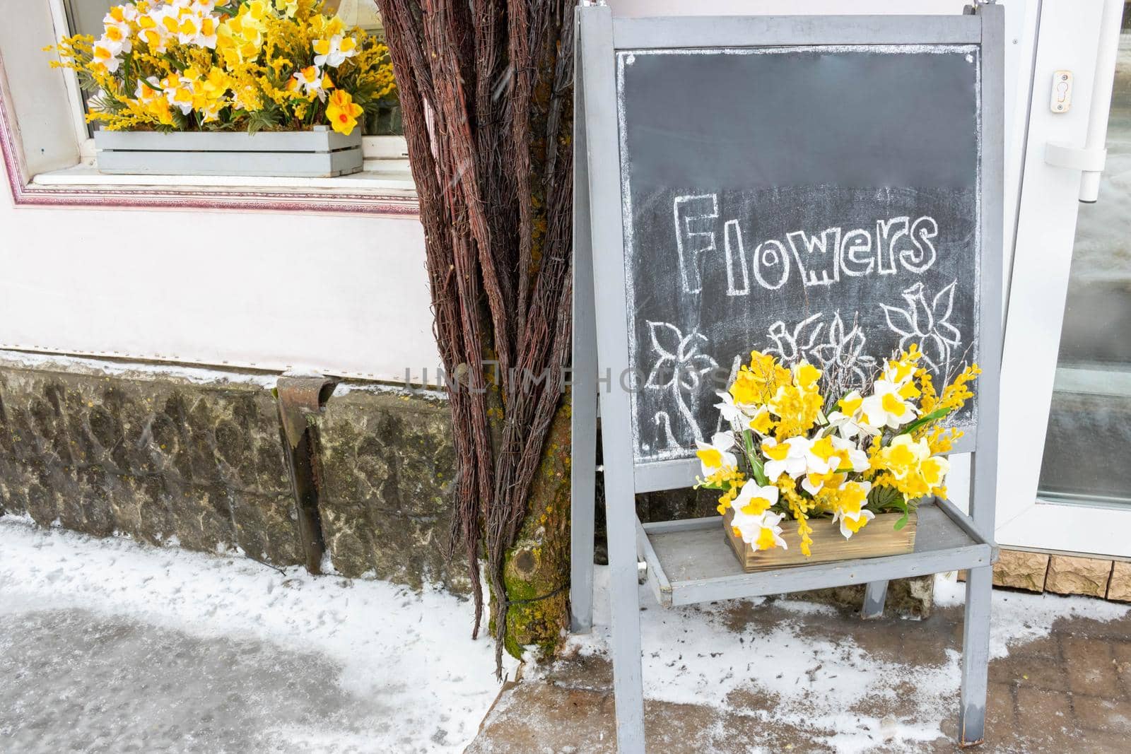 A street billboard outside a flower shop.Advertising of flowers.