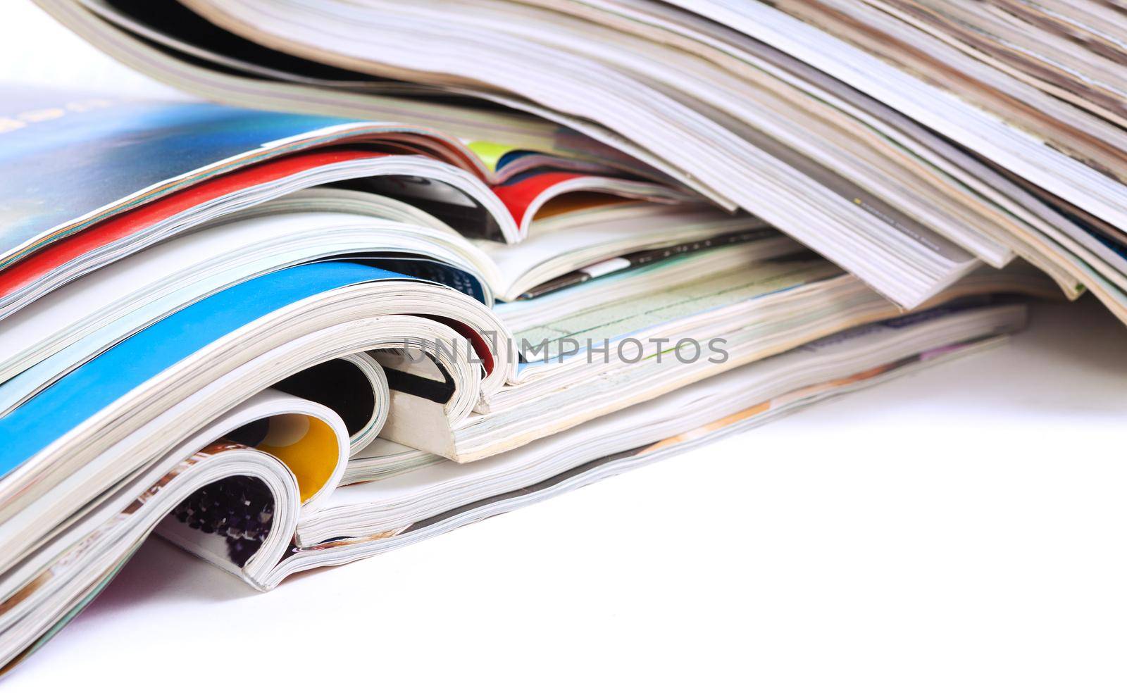 Close up image of magazines stack background. News and media publications