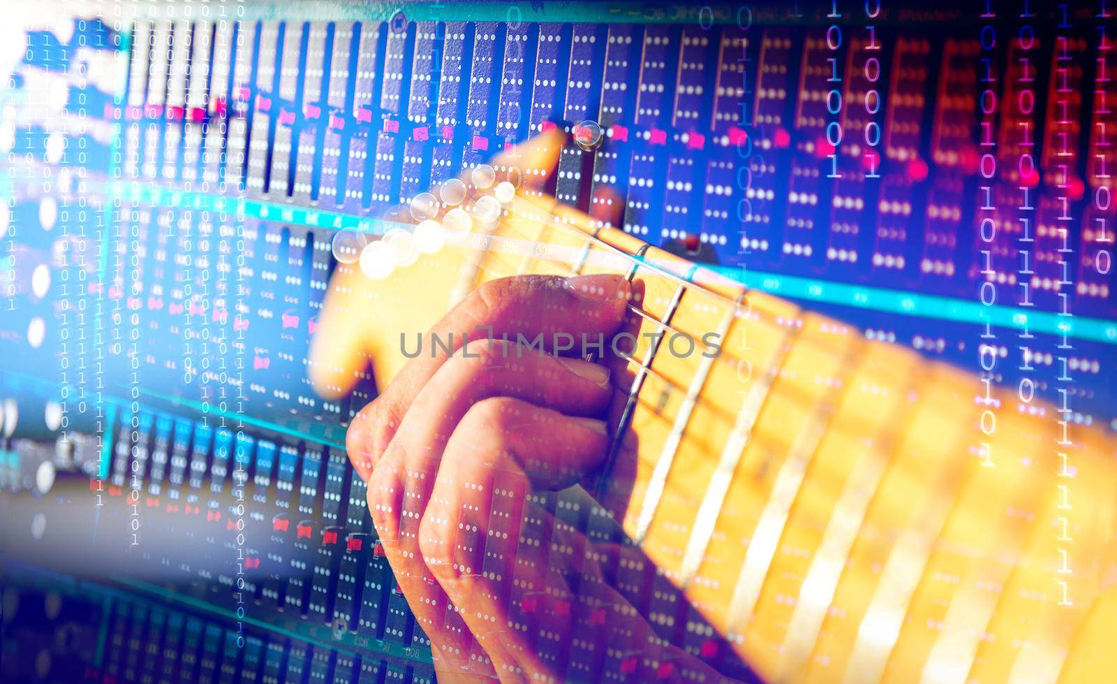 Close-up of guitar player and mixer.Sound engineering and music production