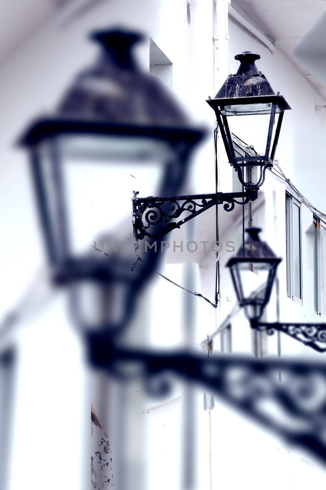 City and old streetlight detail.Town and urban architecture