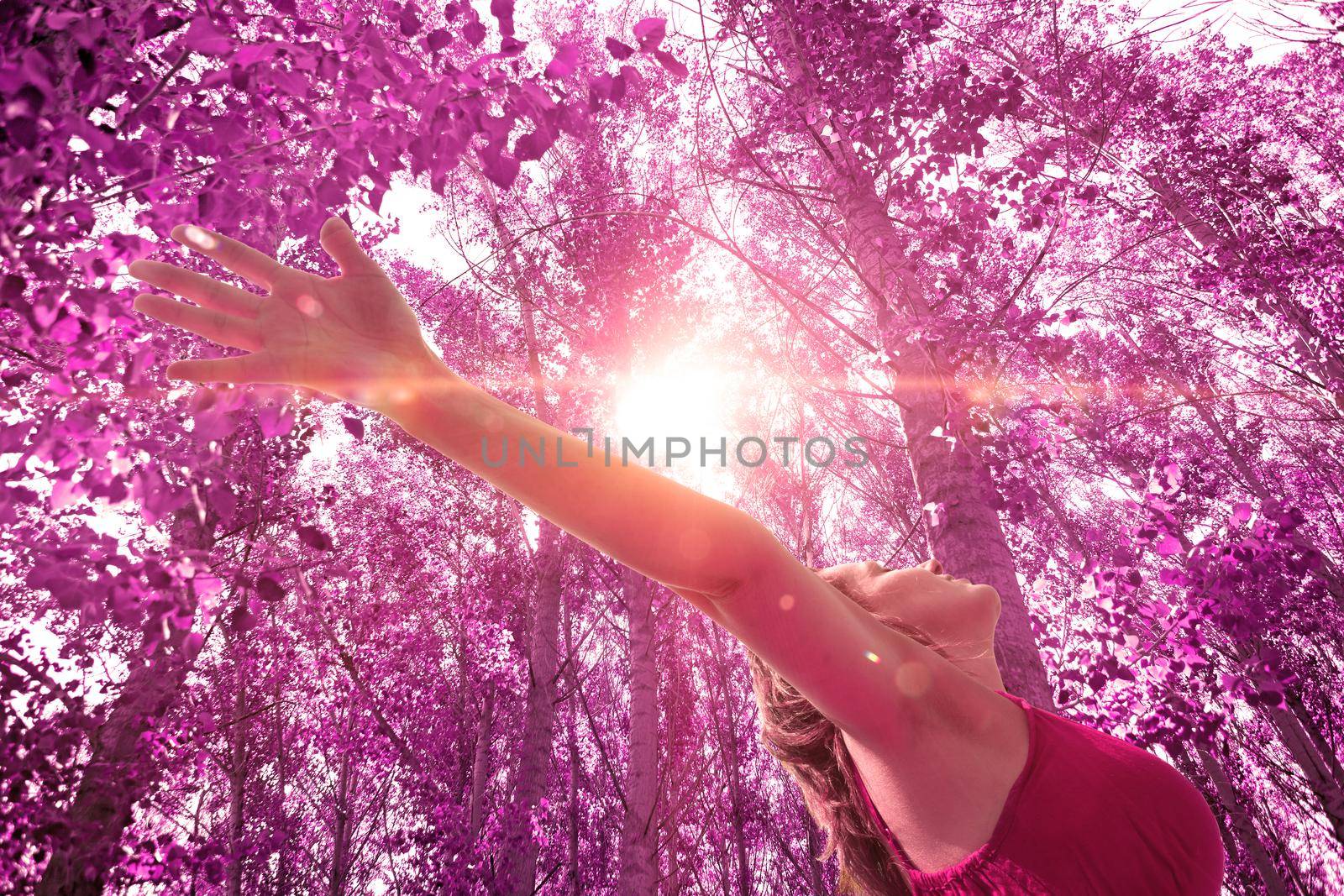 Woman with open arms in nature  by carloscastilla