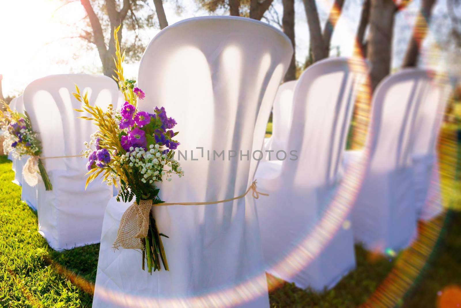 Bunch of flowers and chairs.Romantic and luxury celebration