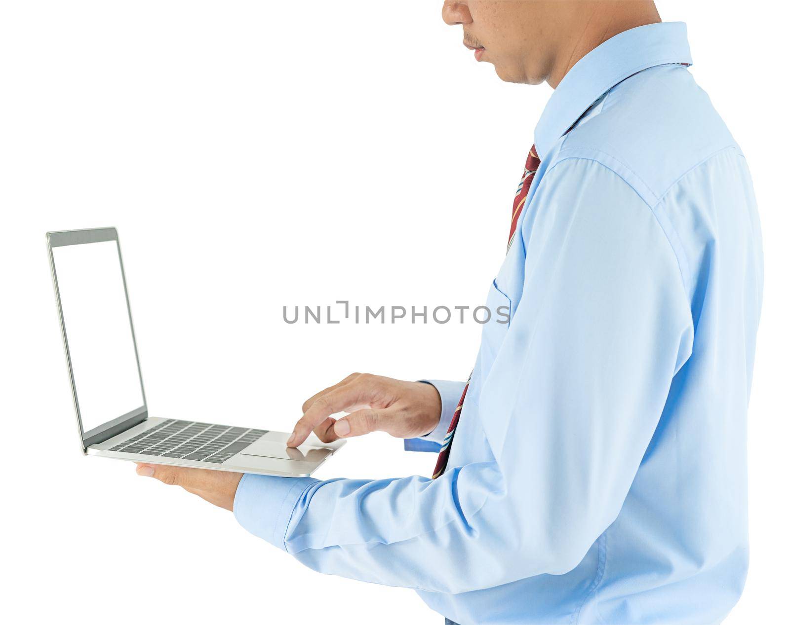 Businessman holding a laptop with clipping path by stoonn