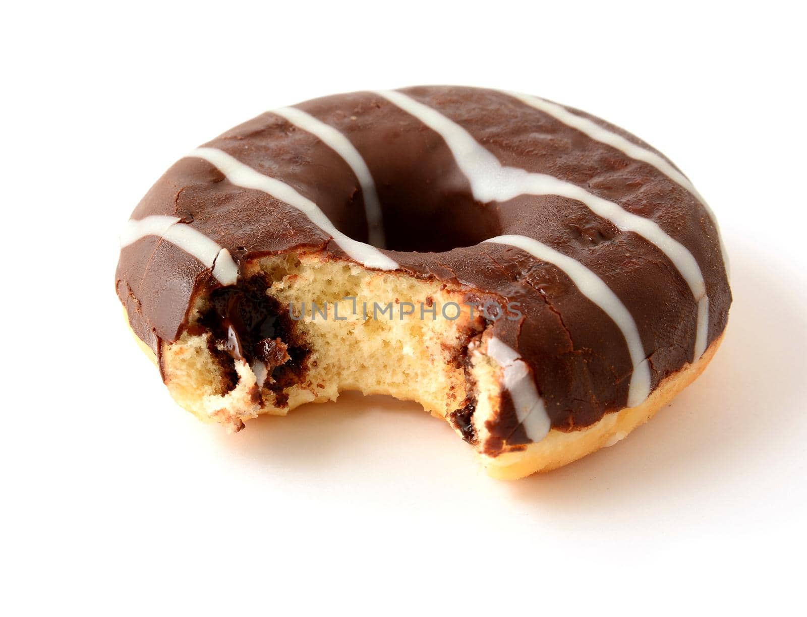 Chocolate donut with missing bite on white background by hamik