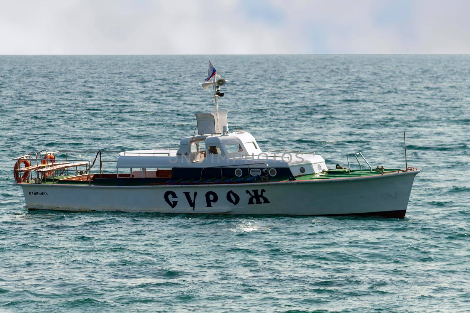Sea pleasure boat, name in Russian language, SUROG. Crimea, Sudak - 10 October 2020. by Essffes