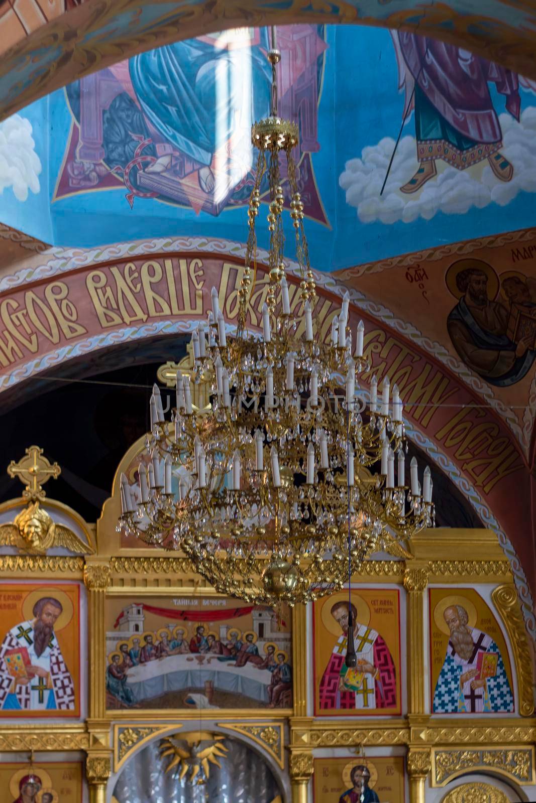 Interior of Christian church, a fragment of iconostasis. Pictured in natural light. View from front. Crimea, Sudak - 10 October 2020. by Essffes