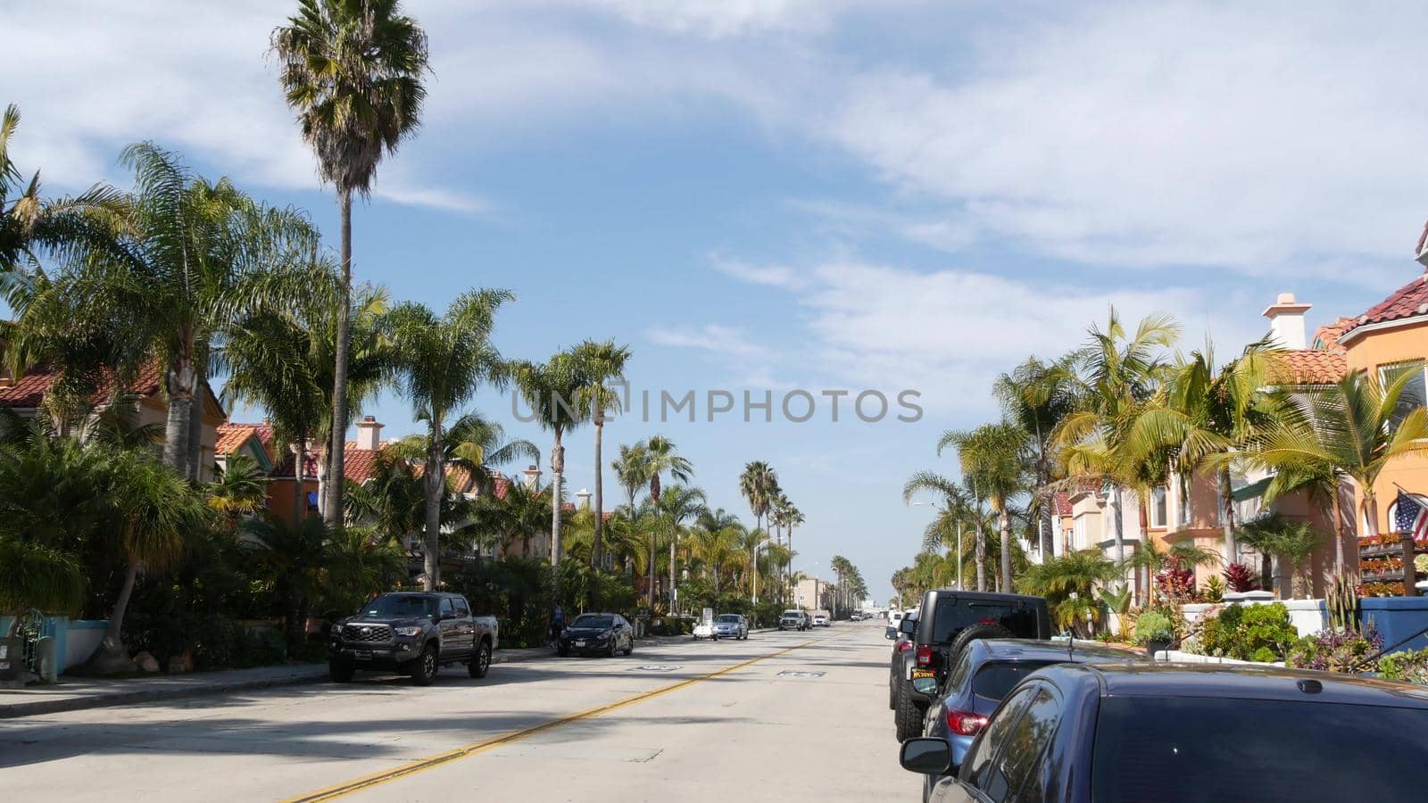 Oceanside, California USA - 27 Jan 2020: Typical suburban street. Different houses in row. Generic american homes, buildings facade, townhouse exterior architecture. Residential district real estate.