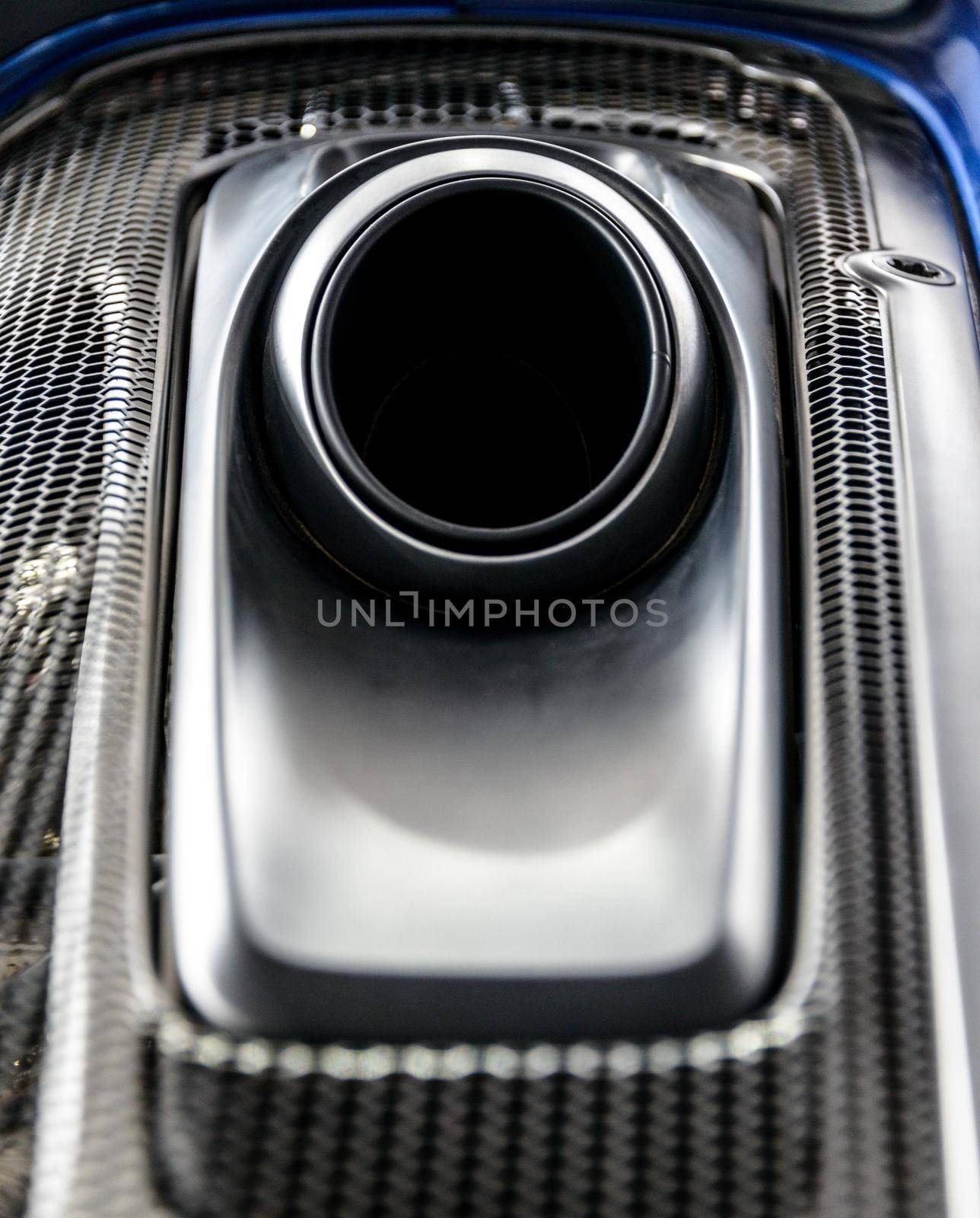 LONDON, UK - CIRCA JUNE 2014: Porsche 918 Spyder top mounted exhaust system detail shot.