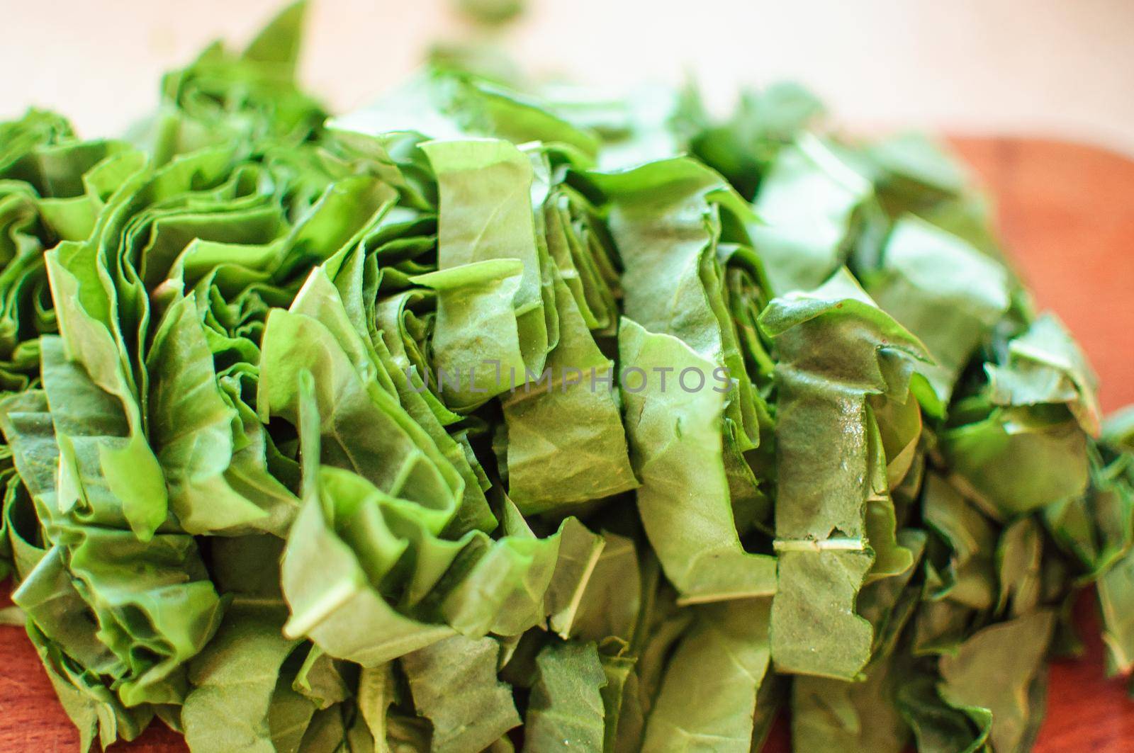 Fresh organic sorrel,plant spinach heap on wooden table for spring green vegetables soup and salad.Raw sorrel leaves top view green vegetable background.Spring green vegetables,sorrel spinach by Alla_Morozova93