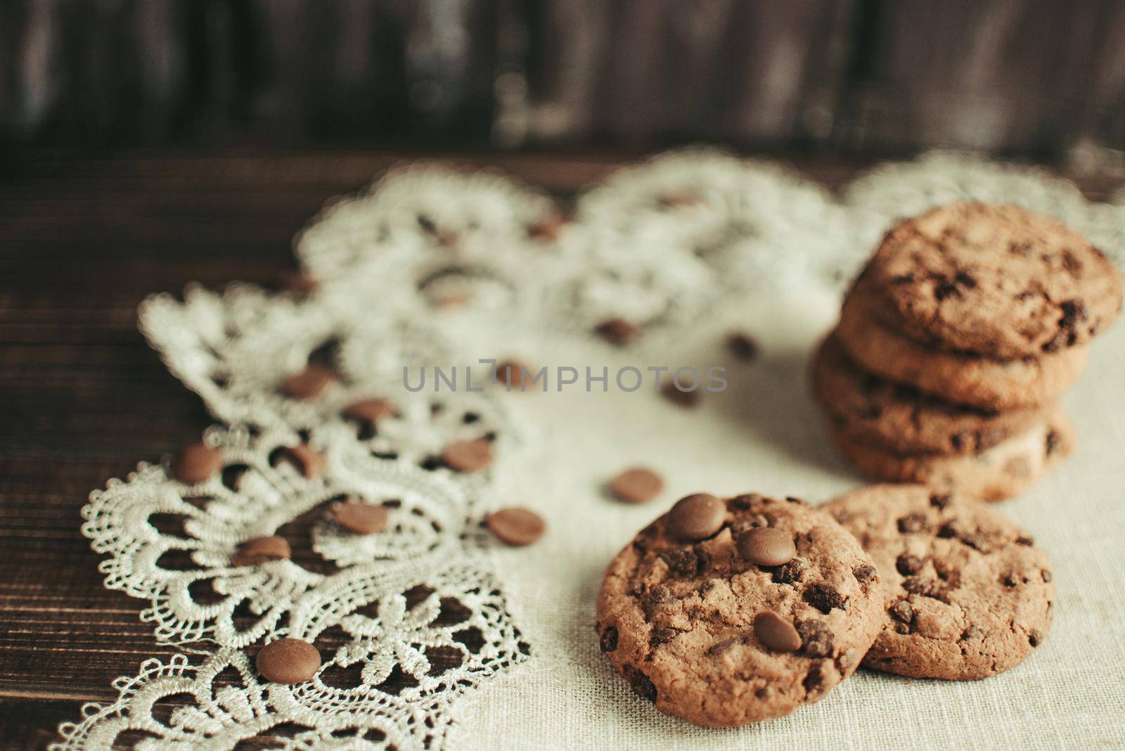 Oatmeal liver lies on a linen tablecloth. Rustic table. Vintage toning. Dietary useful cookies without gluten. Baking for Christmas and New Year .Copy space.
