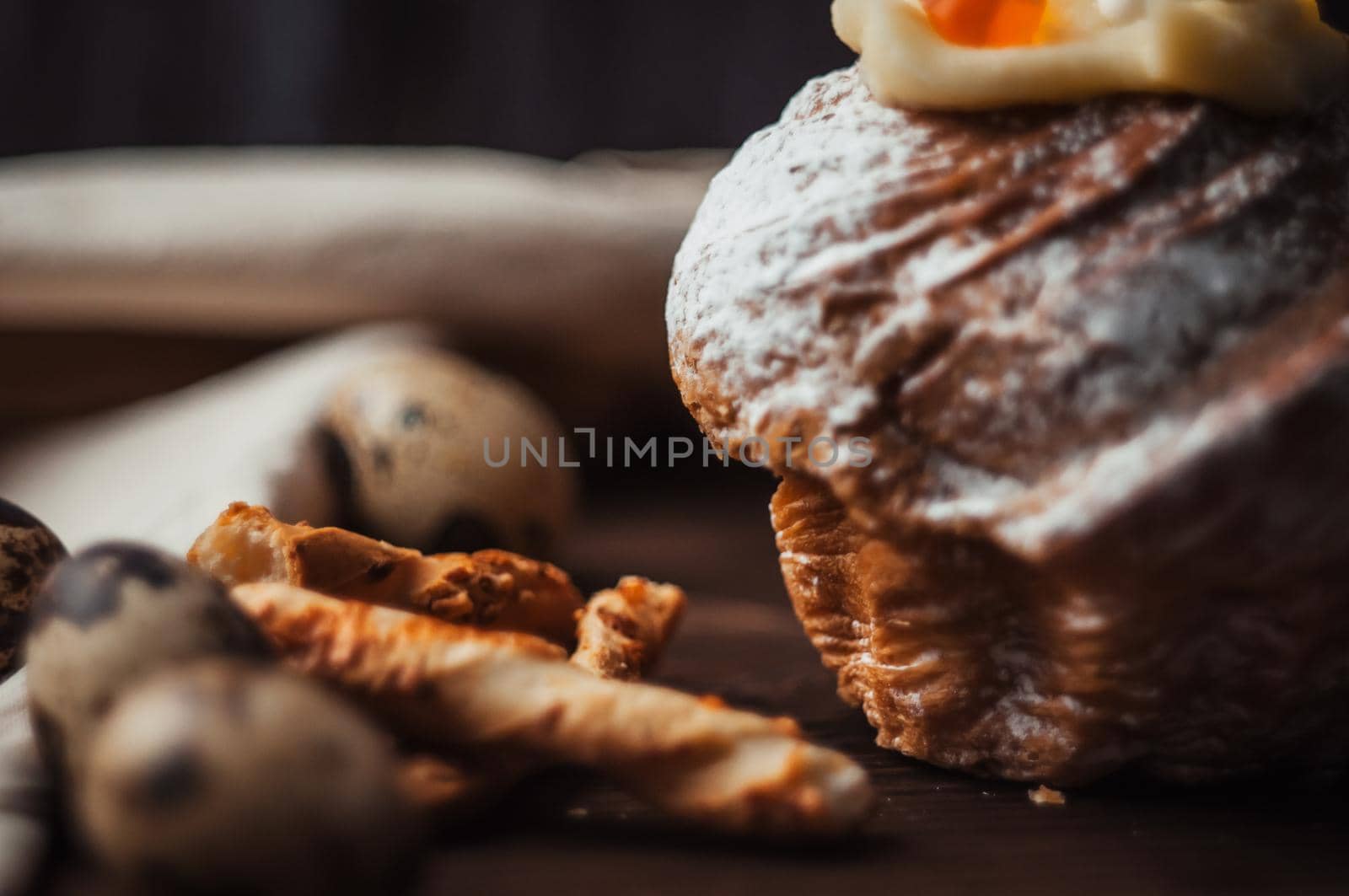 Stylish Easter cake with marshmallows and jelly bears on a dark rustic wooden background. Seasonal Happy Easter greetings. selective focus. modern happy easter image