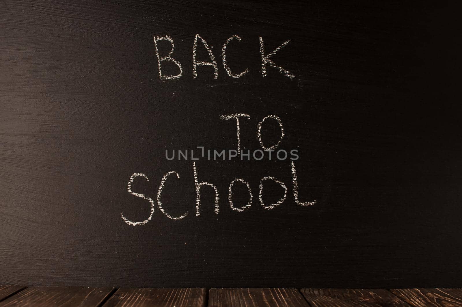 Back to school, the concept of parenting. The inscription on the blackboard with white chalk. Place for text. Copy space. by Alla_Morozova93