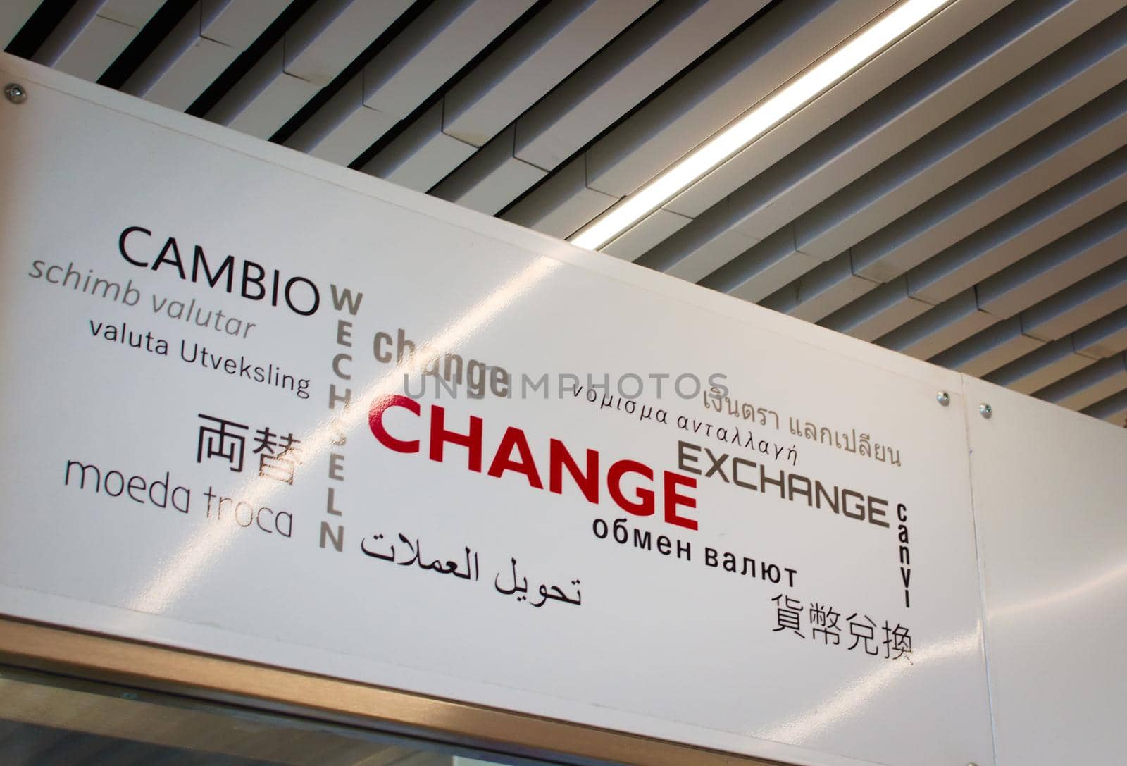Currency exchange sign at an airport.