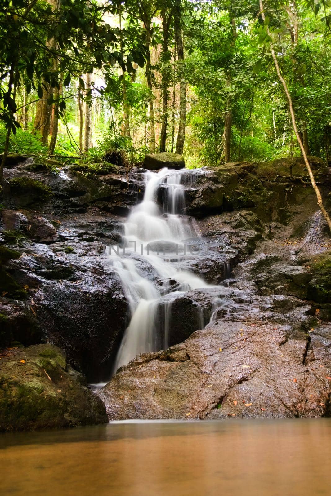 Kathu waterfall in Phuket, Thailand. Beautiful cascade in the jungle.