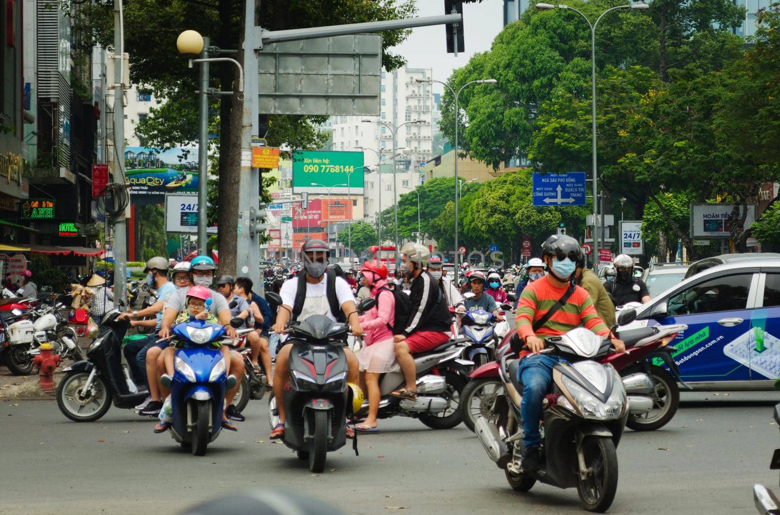 2019-11-10 / Ho Chi Minh City, Vietnam - Urban scene in rush hour. Motorcycles flood the chaotic traffic flow of the city.