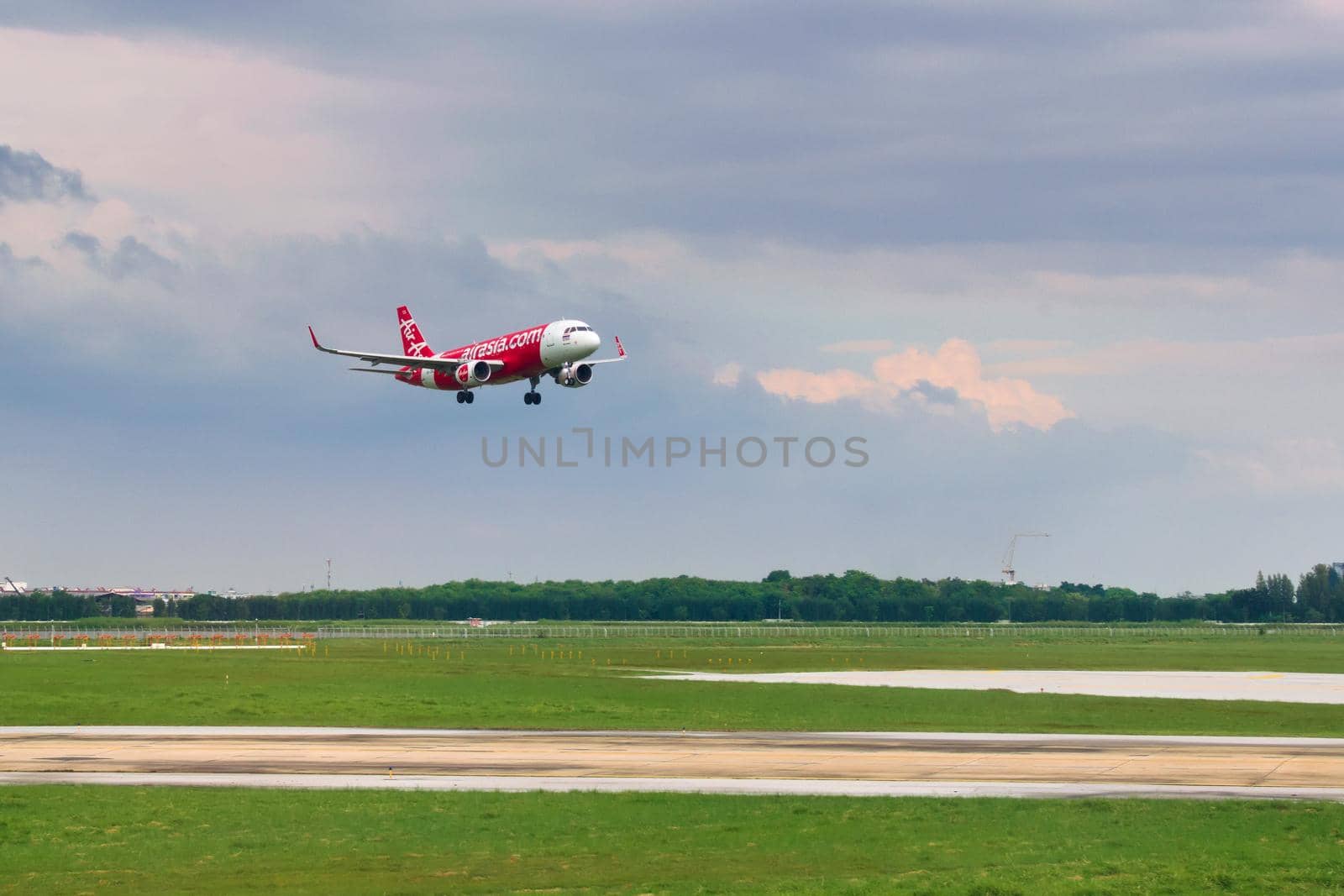 2019-11-14 / Ho Chi Minh City, Vietnam - An Air Asia airliner lining up on the final approach for landing.