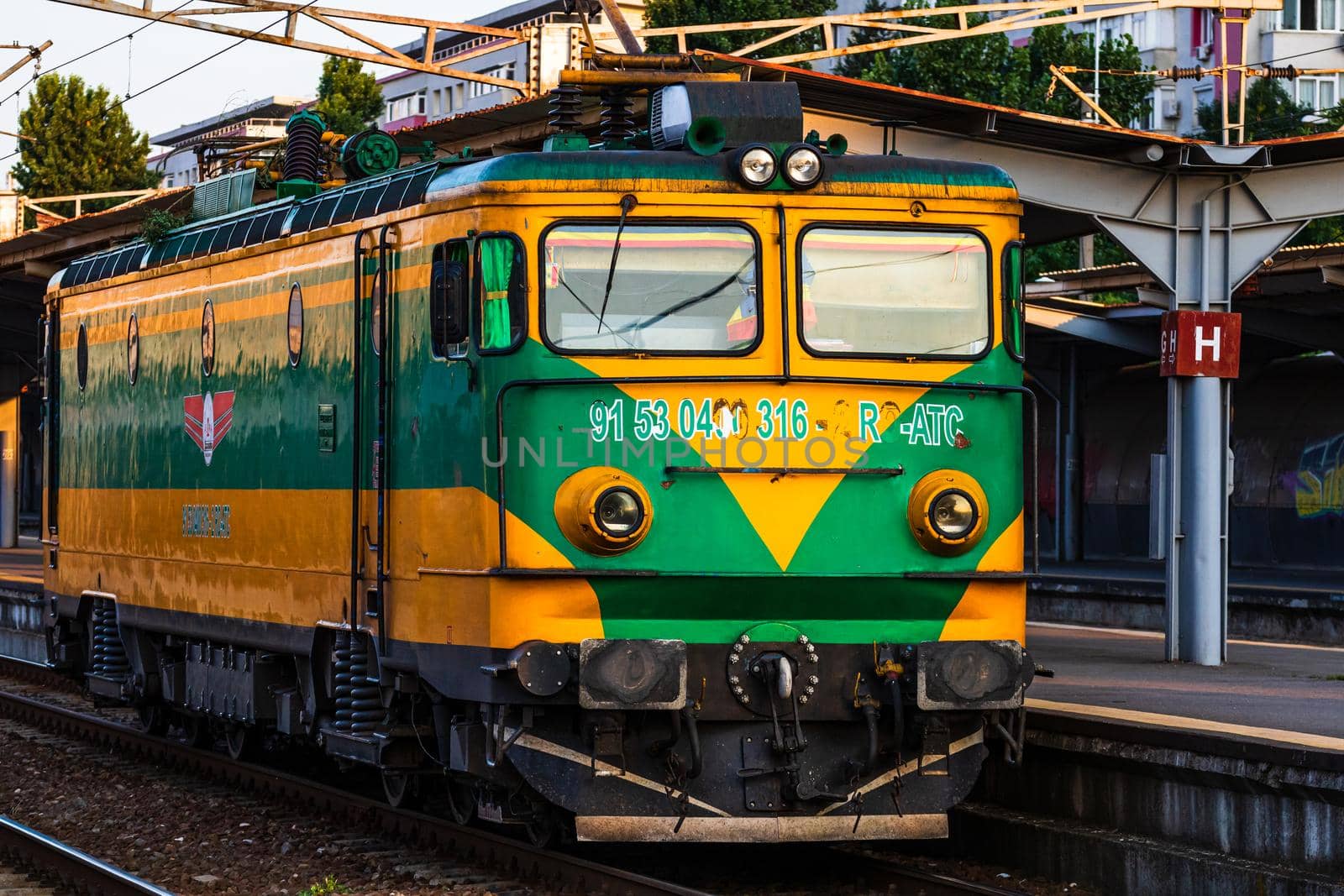 Detail of train in motion at train platform at Bucharest North Railway Station (Gara de Nord Bucharest) in Bucharest, Romania, 2020