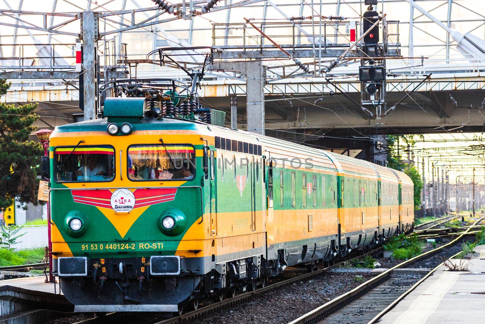 Detail of train in motion at train platform at Bucharest North Railway Station (Gara de Nord Bucharest) in Bucharest, Romania, 2020