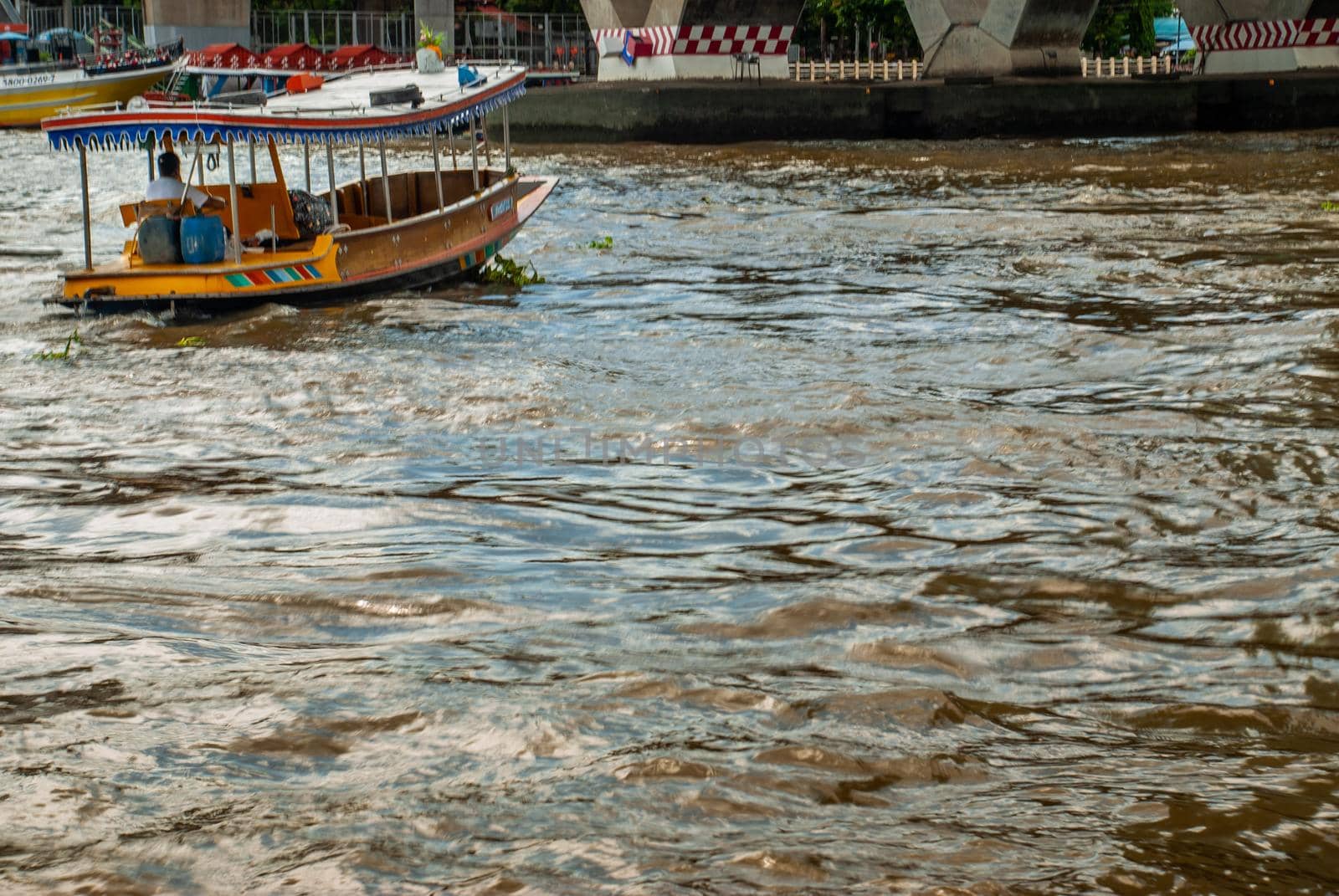 Bangkok, Thailand - 21 Jul 2019 : The passenger ferryboat on the Chao Phraya River. copy space.