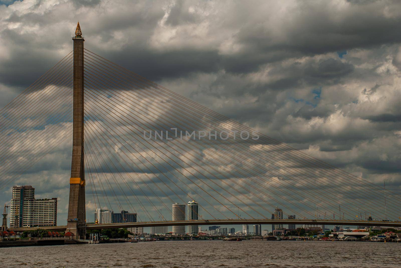Bangkok, thailand 21 Jul, 2019 : Rama Rama VIII bridge, Rope Bridge across the Chao Phraya River of view blue sky is background and Cityscape of Bangkok.